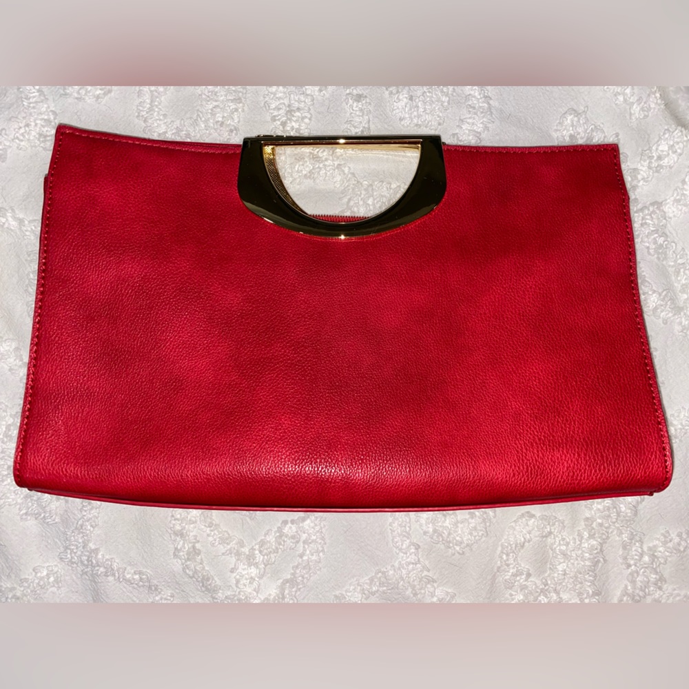 Red clutch with gold handle